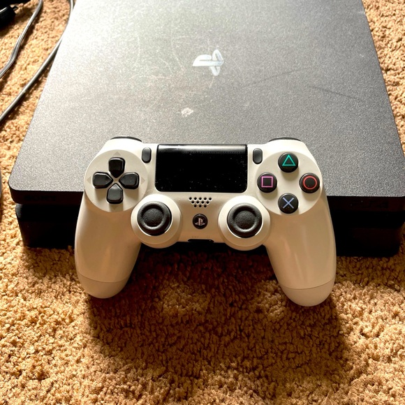 Sony PlayStation Console with white ps controller and wires with a 1400$ account
